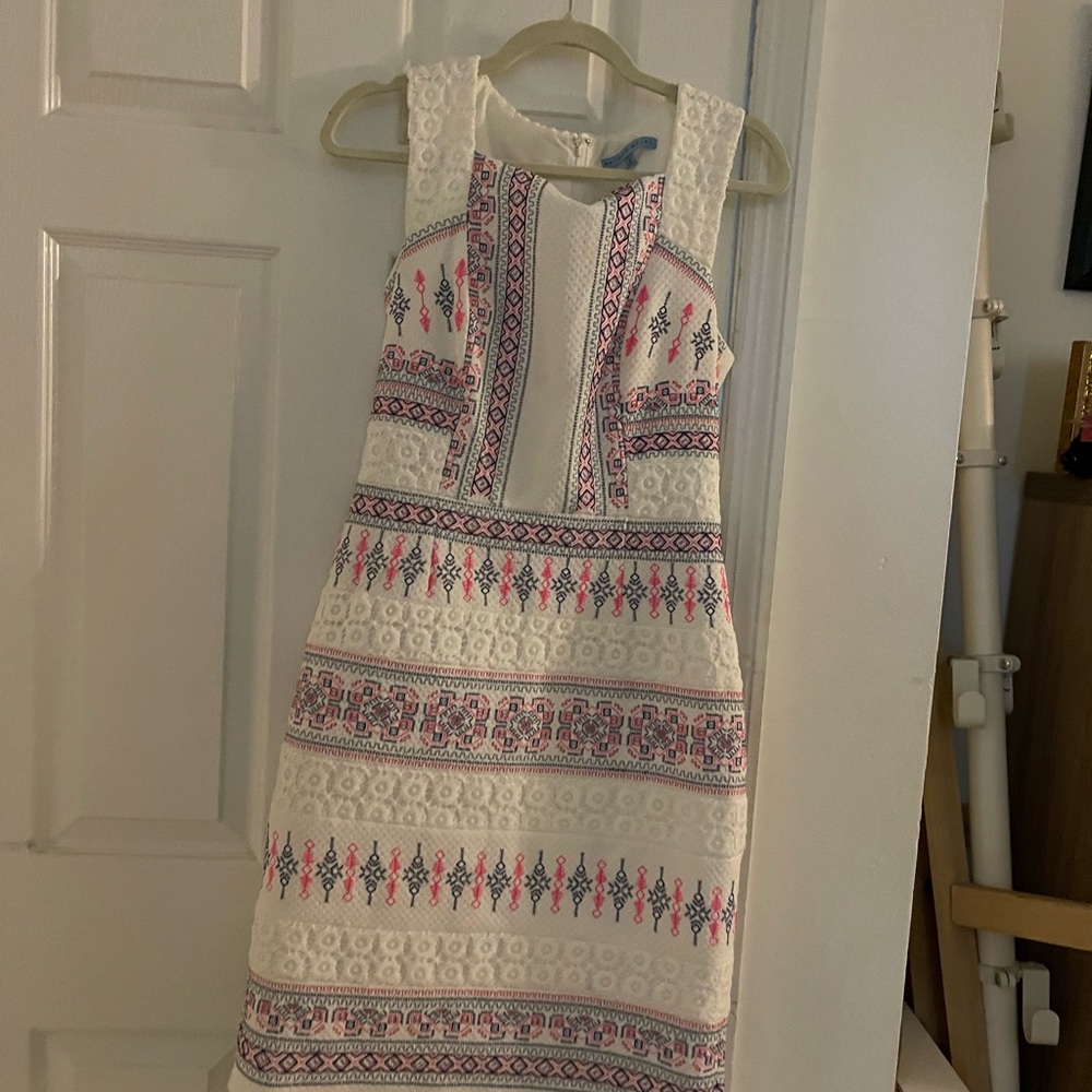 Dress. Knee length.  I am 5’5 it’s knee length on me.